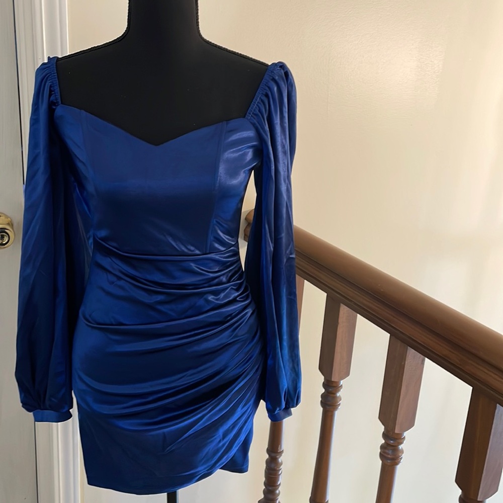 Navy blue cocktail dress. size small. NWT!  body con.